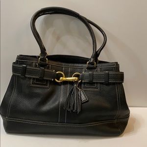 COACH black pebble leather hang bag . Never used